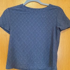 Blue eyelet mid length shirt